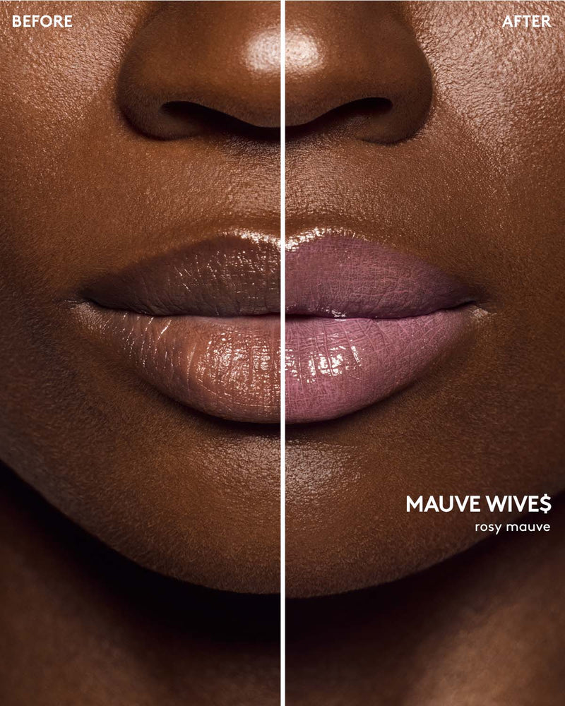 deep skin toned model wearing gloss bomb color drip lip cream in shade mauve wive$
