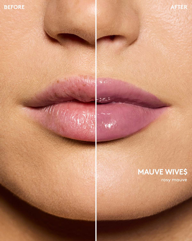 light skin toned model wearing gloss bomb color drip lip cream in shade mauve wive$